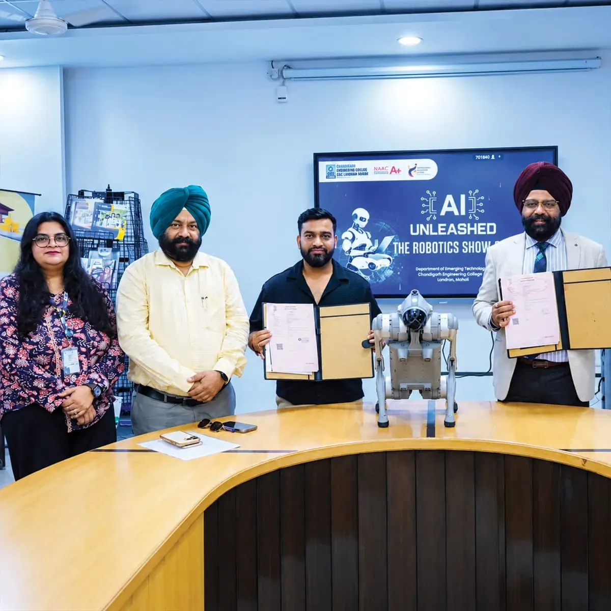 Signing an agreement at Chandigarh Engineering College